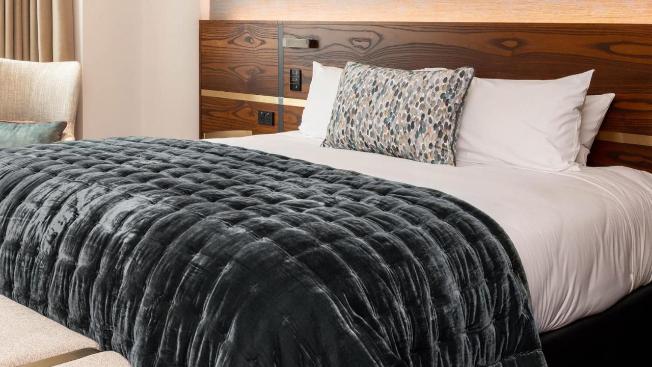 Horizon By Skycity Auckland Dış mekan fotoğraf A bed with a throw